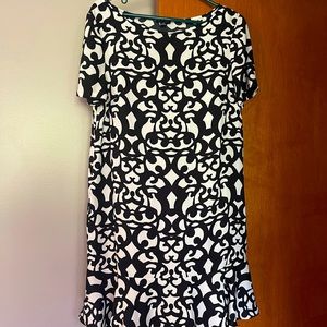 Ann Taylor black & white sheath dress. Short sleeves, scroll ruffle at bottom.
